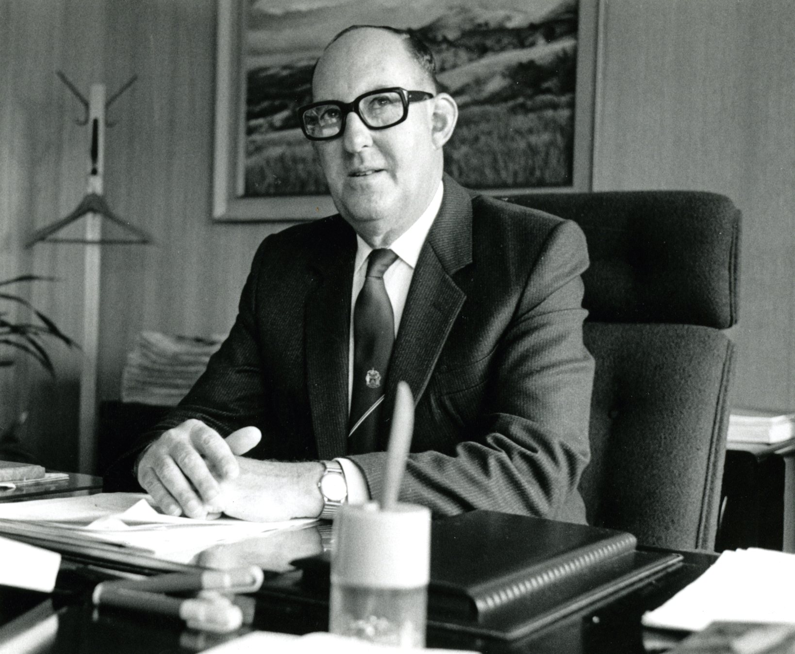 Ron Rathbone sitting at a desk