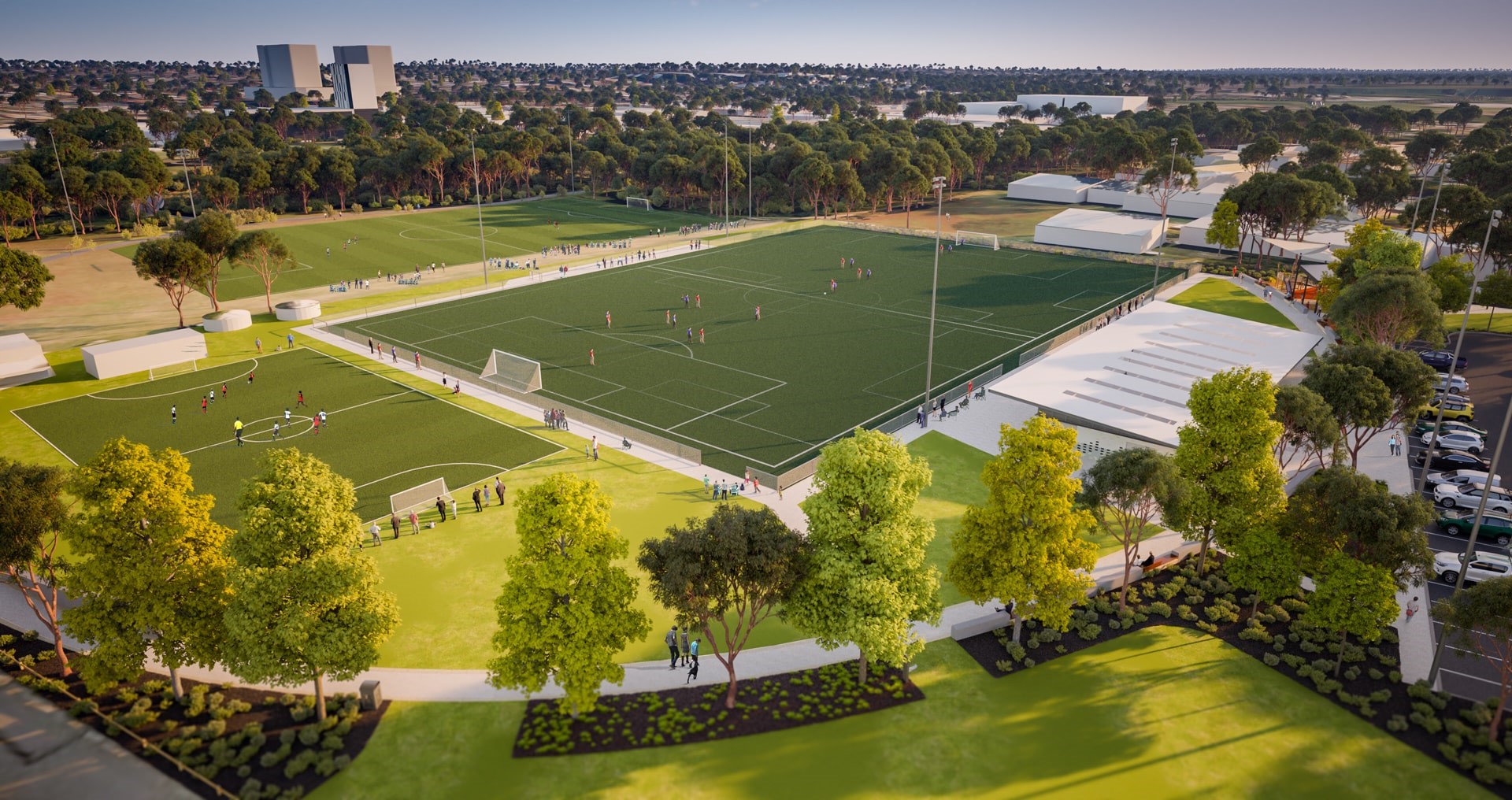 Artists impression of the precinct with one large sports field surrounded by trees and parkland