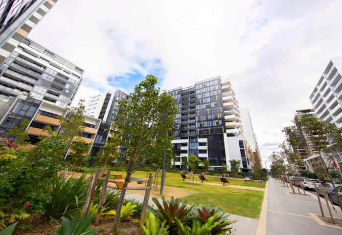 Apartment buildings with a park in front