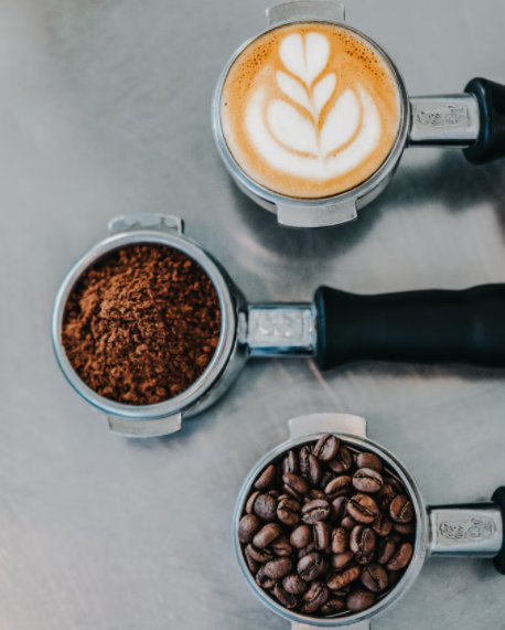 Coffee grinds, beans and foam