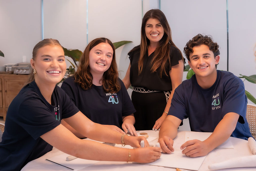 group of people sitting and smiling